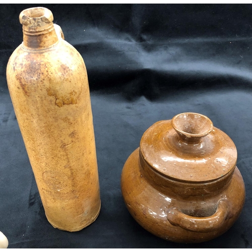 3201 - A glazed earthenware vase, 23cm high, a Govancroft pottery hot water bottle (cracked), a tall earthe... 