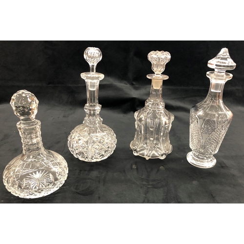 3207 - A Waterford crystal decanter, 2 brandy glasses and 3 other crystal decanters.