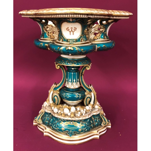 3231 - A Coalport jardiniere on cream and green ground, 34cm high, 28.5cm wide overall (badly cracked)