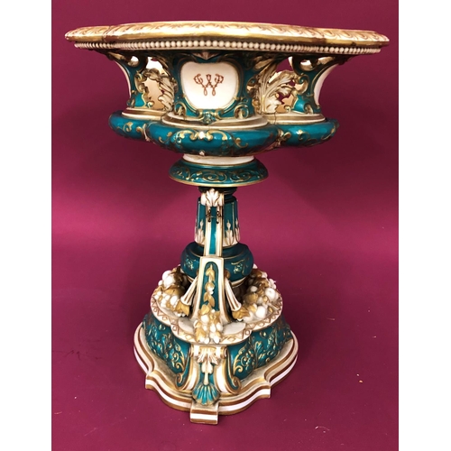 3231 - A Coalport jardiniere on cream and green ground, 34cm high, 28.5cm wide overall (badly cracked)