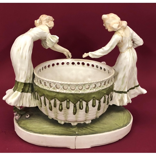 3232 - An Art Nouveau style jardiniere in the form of 2 females holding flower, 45cm wide, 34cm high.