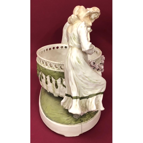 3232 - An Art Nouveau style jardiniere in the form of 2 females holding flower, 45cm wide, 34cm high.