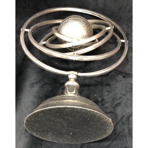 3240 - A chrome Armillary sphere with globe of the earth to centre, 43.5cm high.