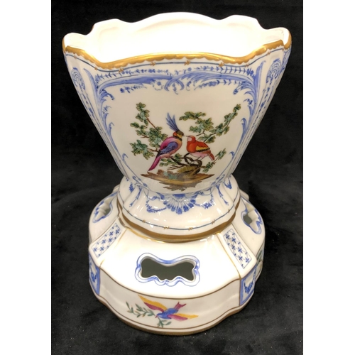 3241 - A reproduction jardiniere on white and blue ground and multi-coloured bird, tree and gilt decoration... 