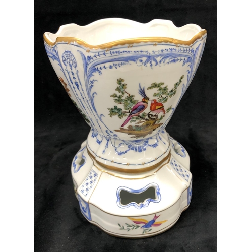 3241 - A reproduction jardiniere on white and blue ground and multi-coloured bird, tree and gilt decoration... 