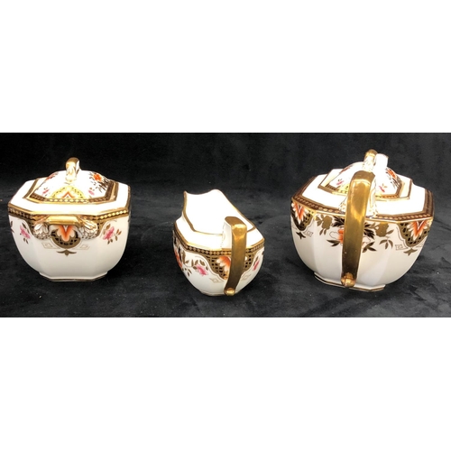 3242 - A Wedgwood Imari teapot, sugar bowl and cream jug. (3)