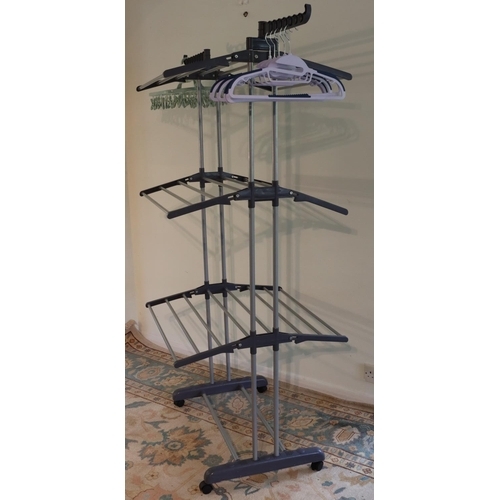 3112 - A grey plastic freestanding clothes rack on wheels, 172cm high overall, 73cm wide, 65cm deep. (This ... 