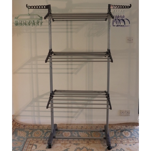 3112 - A grey plastic freestanding clothes rack on wheels, 172cm high overall, 73cm wide, 65cm deep. (This ... 