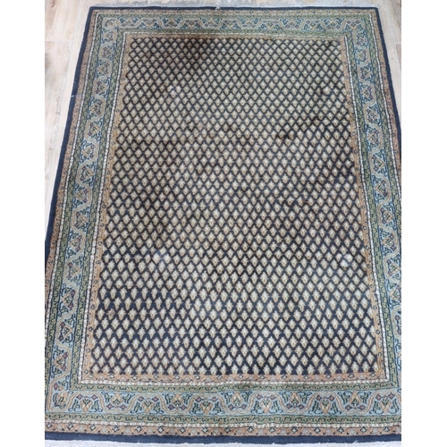 3119 - A black, grey, green, cream and red rug, 173cm wide, 252cm long. (This item is not held by PF Windib... 