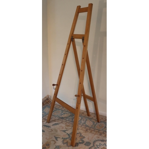 3121 - A large wooden artist's easel 177.5cm high overall, 76cm wide. (This item is not held by PF Windiban... 