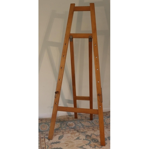 3121 - A large wooden artist's easel 177.5cm high overall, 76cm wide. (This item is not held by PF Windiban... 