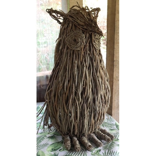 3147 - A large wicker owl, 81cm high overall. (This item is not held by PF Windibank - please call prior to... 