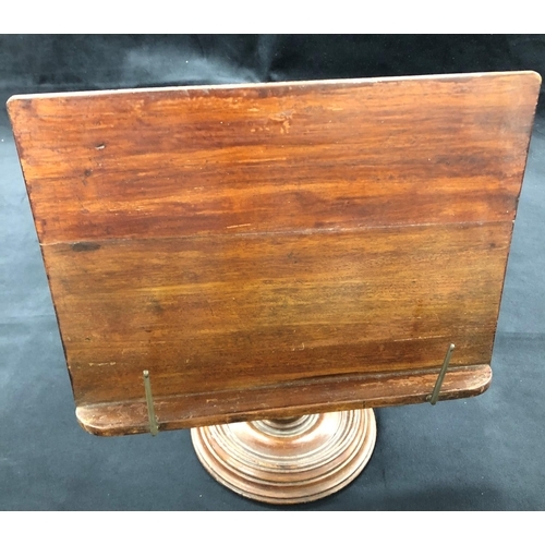 3204 - A 19th Century mahogany book stand, 33cm wide, 35cm high.