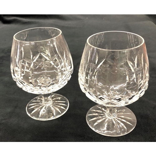 3207 - A Waterford crystal decanter, 2 brandy glasses and 3 other crystal decanters.