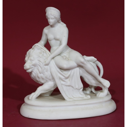 105 - A Parian classical group of half naked lady seated upon a lion, on oblong base, 18cm high