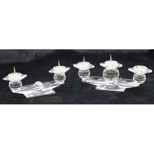 121 - A Swarovski crystal 3-pronged candlestick (1 prong missing), 19.5cm long and another similar 2-prong... 