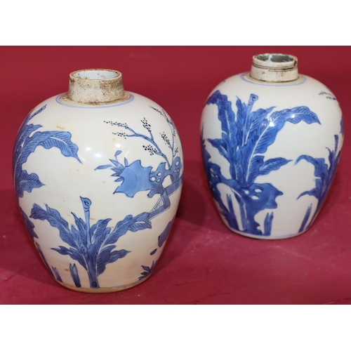 22 - A pair of near matching 18th/19th Century Chinese round bulbous shaped small ginger jars on blue and... 