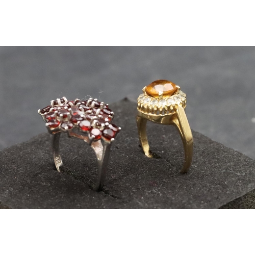 364 - A 9ct gold cluster ring set with yellow centre stone, Size L/M, a silver ladies' cluster ring set wi... 