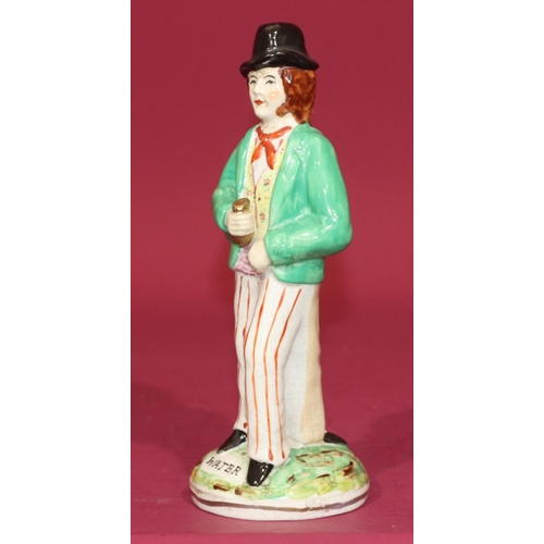 4 - A 19th Century Staffordshire back-to-back standing figure of a gentleman 