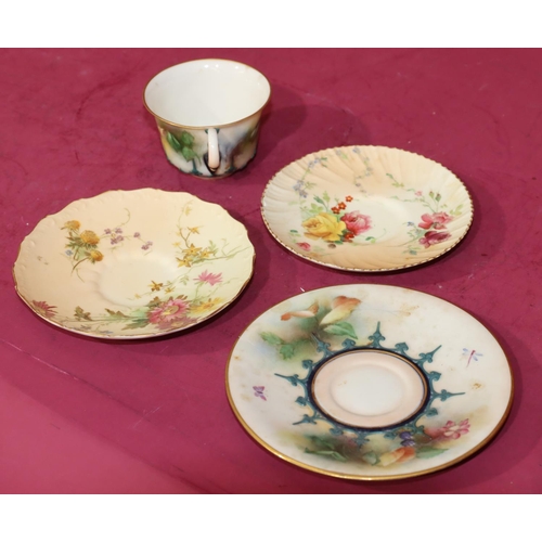 67 - A Hadley's Worcester teacup and saucer with hand painted fruit, floral and leaf decoration (cup chip... 