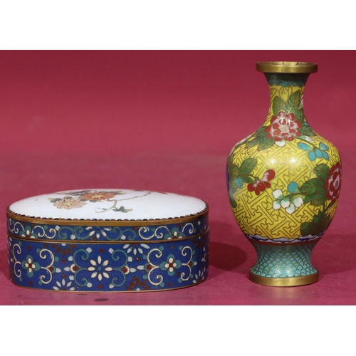 670 - A Cloisonne oblong lidded pot on white and blue ground, with allover floral and leaf decoration, 13c... 