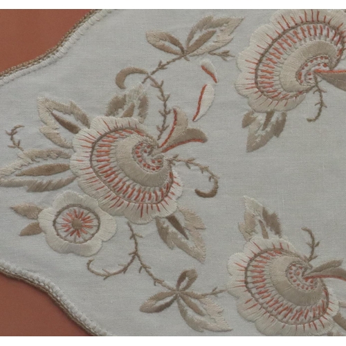 671 - A needlework panel with floral and leaf decoration mounted in modern gilt frame, 35.5 x 92cm.