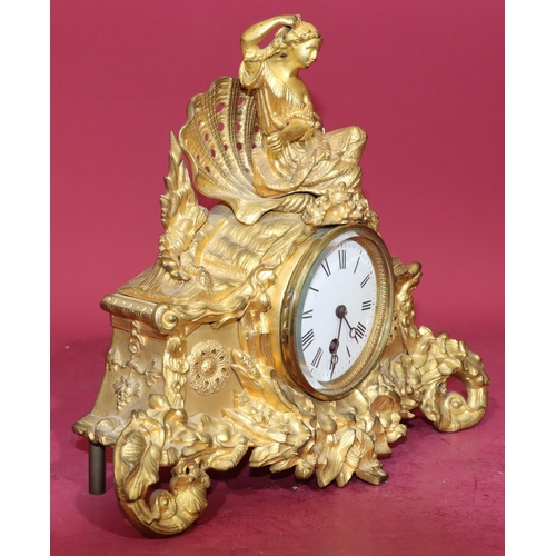 680 - R & C gilt spelter time piece with raised figure motif to top and allover raised floral and leaf dec... 