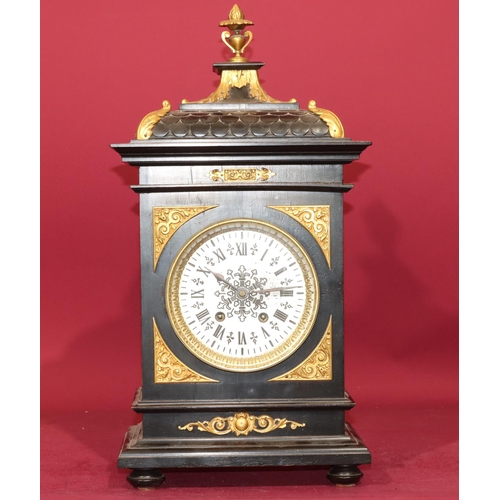 682 - Lenzkirch, black ebonised 8-day striking mantel clock with allover gilt metal mounts and urn finial ... 