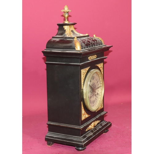 682 - Lenzkirch, black ebonised 8-day striking mantel clock with allover gilt metal mounts and urn finial ... 