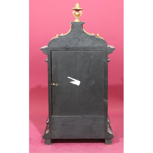 682 - Lenzkirch, black ebonised 8-day striking mantel clock with allover gilt metal mounts and urn finial ... 