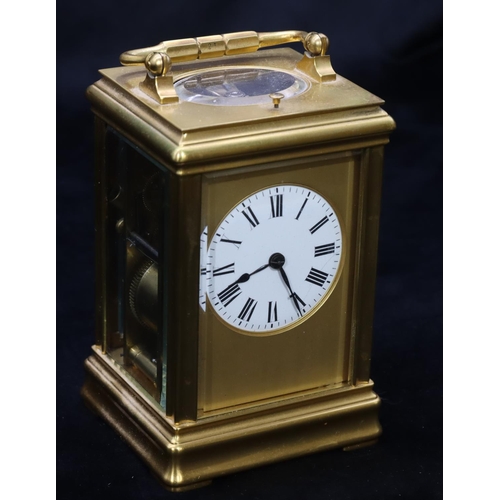 684 - A brass half-striking repeat carriage clock, stamped G & B to movement, with circular white enamel d... 