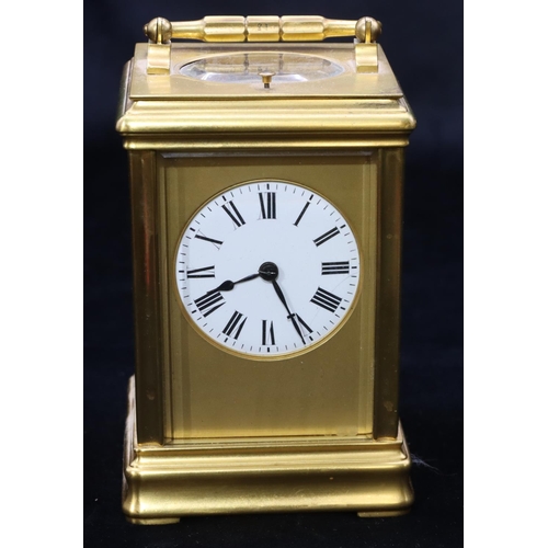 684 - A brass half-striking repeat carriage clock, stamped G & B to movement, with circular white enamel d... 