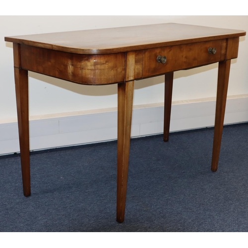 694 - An Edwardian mahogany serving table with inlaid stringing, centre drawer, on 4 square tapering legs,... 