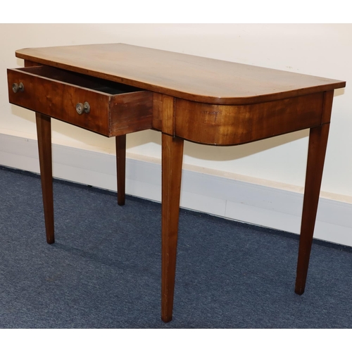 694 - An Edwardian mahogany serving table with inlaid stringing, centre drawer, on 4 square tapering legs,... 