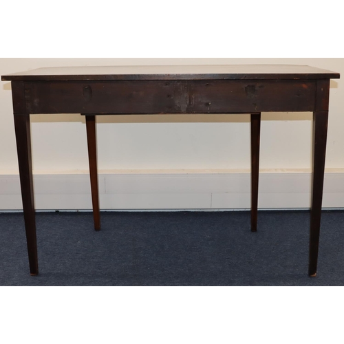 694 - An Edwardian mahogany serving table with inlaid stringing, centre drawer, on 4 square tapering legs,... 