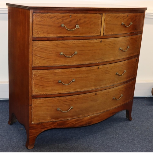 695 - A large Edwardian mahogany bow fronted chest of drawers with allover inlaid banding and stringing, 2... 