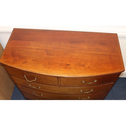 695 - A large Edwardian mahogany bow fronted chest of drawers with allover inlaid banding and stringing, 2... 