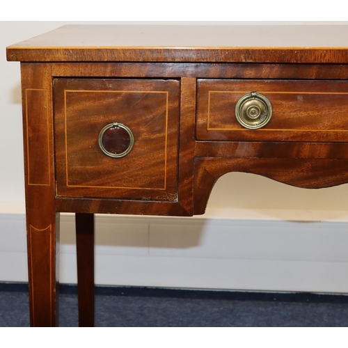 698 - A 19th Century mahogany lowboy with inlaid stringing, centre drawer above arch kneehole, flanked by ... 