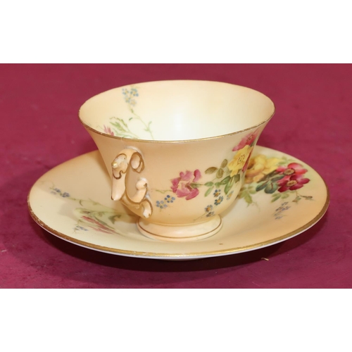 70 - A Royal Worcester Blush 2-handled cup and saucer with multi-coloured floral, leaf and gilt decoratio... 