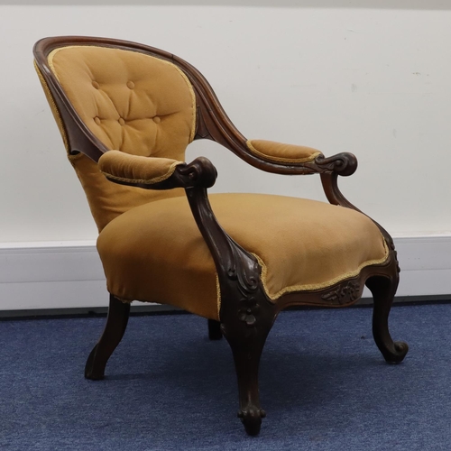 710 - A 19th Century walnut spoon back armchair with beige velvet overstuffed seat, button back and padded... 