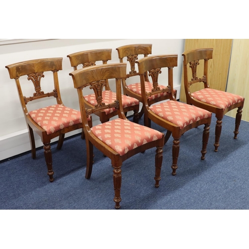 711 - A set of 6 19th Century mahogany dining chairs with pierced splat backs, pink floral drop-in seats, ... 