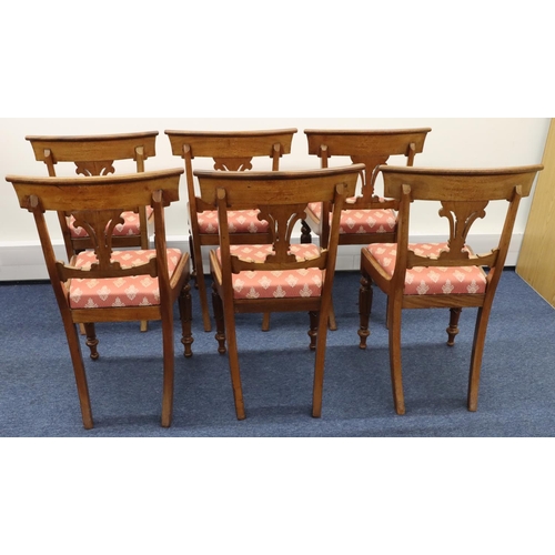 711 - A set of 6 19th Century mahogany dining chairs with pierced splat backs, pink floral drop-in seats, ... 