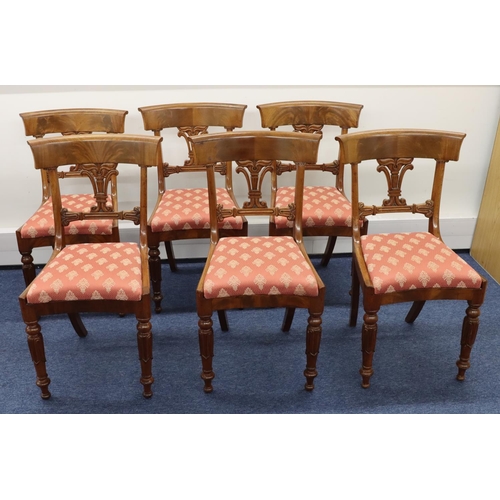 711 - A set of 6 19th Century mahogany dining chairs with pierced splat backs, pink floral drop-in seats, ... 