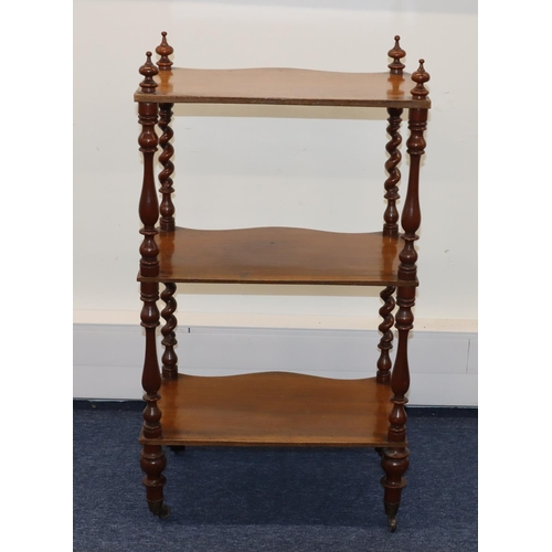 715 - A 19th Century 3-tier Serpentine fronted whatnot with barley twist supports, turned legs on brass to... 