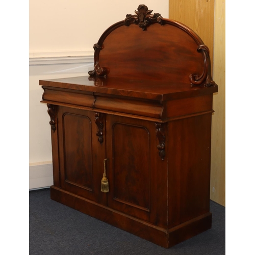 716 - A 19th Century mahogany chiffonier with arched back and raised shell and scroll mounts, 2 drawers ab... 