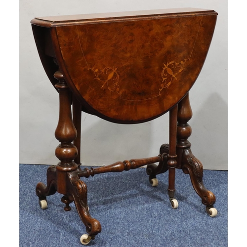 719 - A Victorian burr walnut small oval Sutherland table with part inlaid stringing, on turned stem with ... 