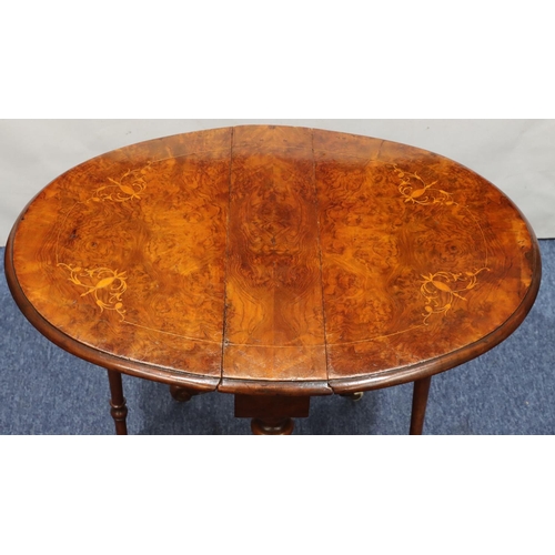 719 - A Victorian burr walnut small oval Sutherland table with part inlaid stringing, on turned stem with ... 