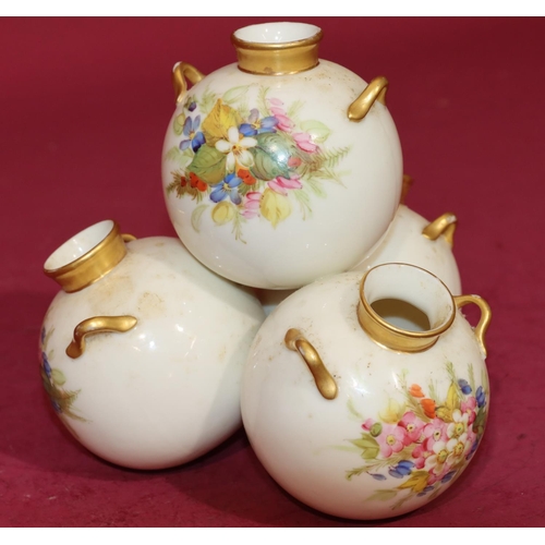 72 - A Royal Worcester vase in the form of 4 balancing bulbous 2-handled vases on white and gilt ground w... 