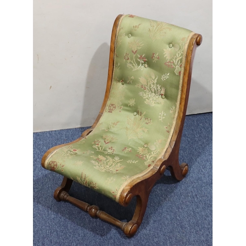 722 - A mahogany slipper nursing chair with green buttoned overstuffed seat and back, on splayed legs.