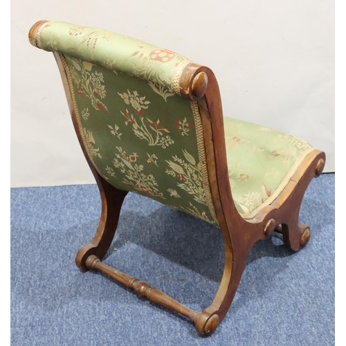 722 - A mahogany slipper nursing chair with green buttoned overstuffed seat and back, on splayed legs.